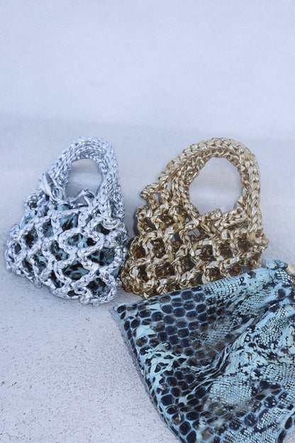 Metallic knitted bag